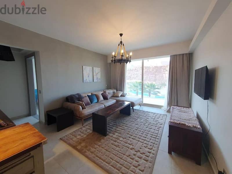 With a 5% down payment, an apartment for sale in a private garden, fully finished, with air conditioners, and fully furnished (Mont Gualal), Ain Sakha 8