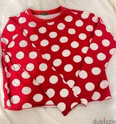 red and white polka dots top