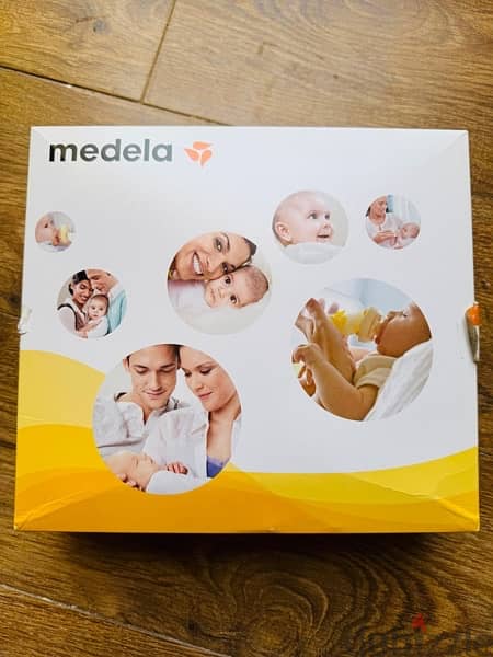 Medela Mini Electric breastpump مضخه صدر كهربائيه سويسريه 5