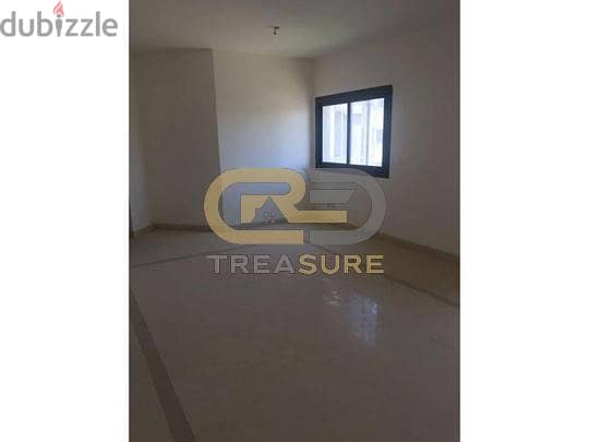 Apartment for rent in mivida with Kitchen & Acs  . 8