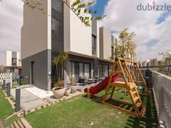 Fully Finished Townhouse for Sale with Down Payment and Installments in Al Buoruj with Prime Location on Greenery Landscape 0