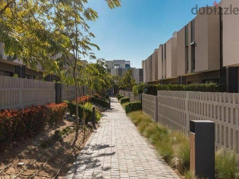 Fully Finished Townhouse for Sale with Down Payment and Installments in Al Buoruj with Prime Location on Greenery Landscape 3