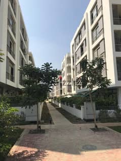 Apartment for sale in New Cairo, lowest price and more than one payment system in Taj City Compound