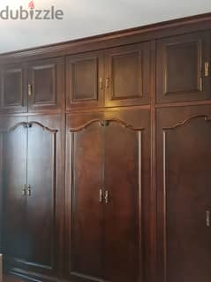 Almost new placard closet peach and oak wood