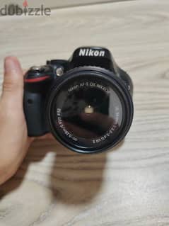 Camera Nikon D5200 
lens 18-55

All accessories included