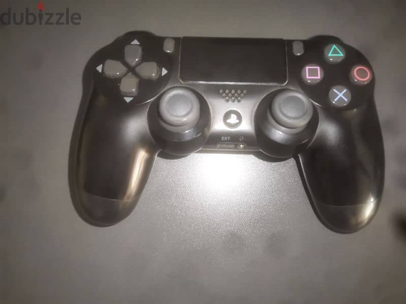 playstation 4 slim 500gb with its original controller and 2 games 6