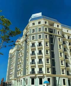 Apartment for sale with a sea view, immediate receipt, fully finished, in the Latin Quarter, New Alamein, North Coast
