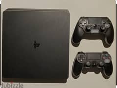 PlayStation 4 slim 500 GB with 4 joysticks & installed games fifa 2024