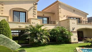 Twin house villa for sale in Swan Lake Hassan Allam Compound, directly in front of Al-Rehab