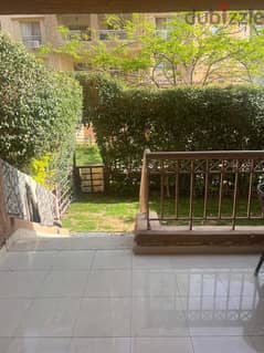 for sale apartment with garden fully finished ready to move with furnished & ACs and kitchen in Madinaty