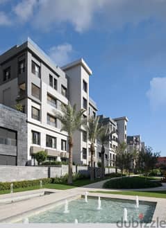 Apartment with installments over 9 years with Very prime location in Trio Garden Compound New Cairo