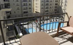 شقة متشطبة بالكامل للإيجار 133م موقع متميز فيو حمام سباحة ميفيدا القاهرة الجديدة mivida  NEW CAIRO