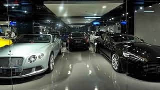 Car showroom for sale, fully finished, with air conditioners, in the first mega mall on Suez Road, in installments over 6 years.