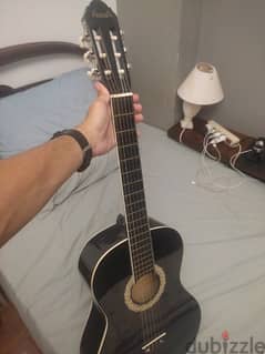acoustic guitar + guitar pick + 2 nylon strings +bag
