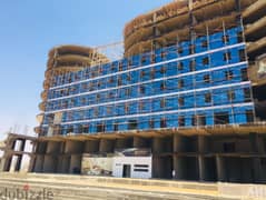 Office 140 meters, immediate delivery with a 15% discount with only 15% down payment, first number on Al Amal and Ministries axis in the MU23 area,