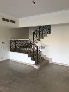 Townhouse with private garden for rent fully finished with kitchen & Acs