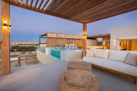 Two-room open roof chalet for sale in Azhaa North Coast village (Madar Company) finished chalet on the largest illuminated crystal lagoon Azhaa North