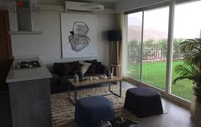 Luxury villa for sale in Telal East Compound, New Cairo, with high privacy, view on artificial lakes and green spaces, in installments over 8 years