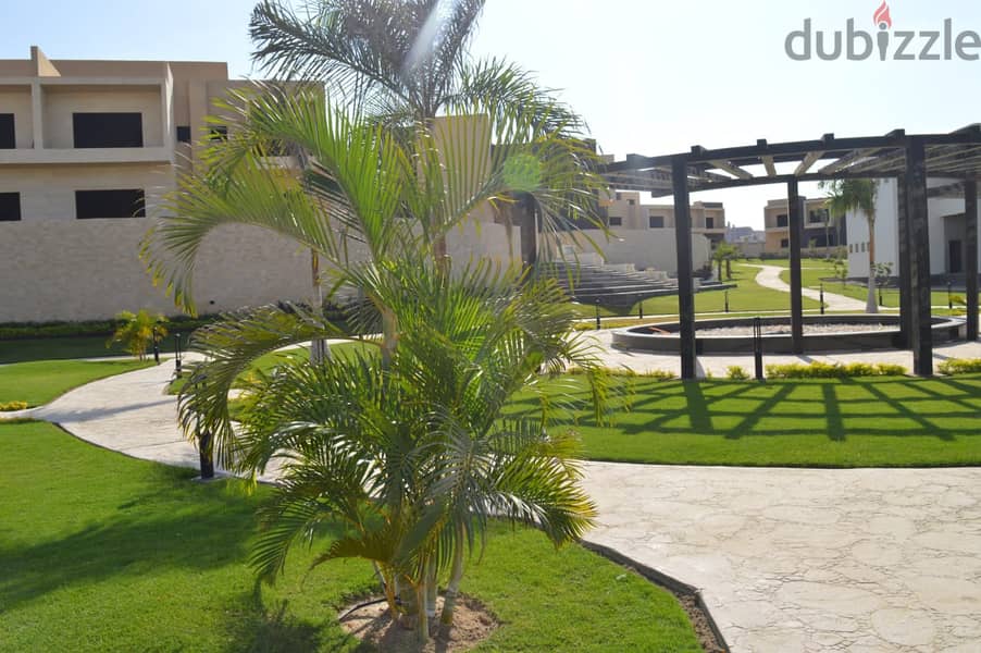 Come inspect and receive immediately an apartment with a private roof in the heart of old Sheikh Zayed in front of Nile University, with a special ins 8