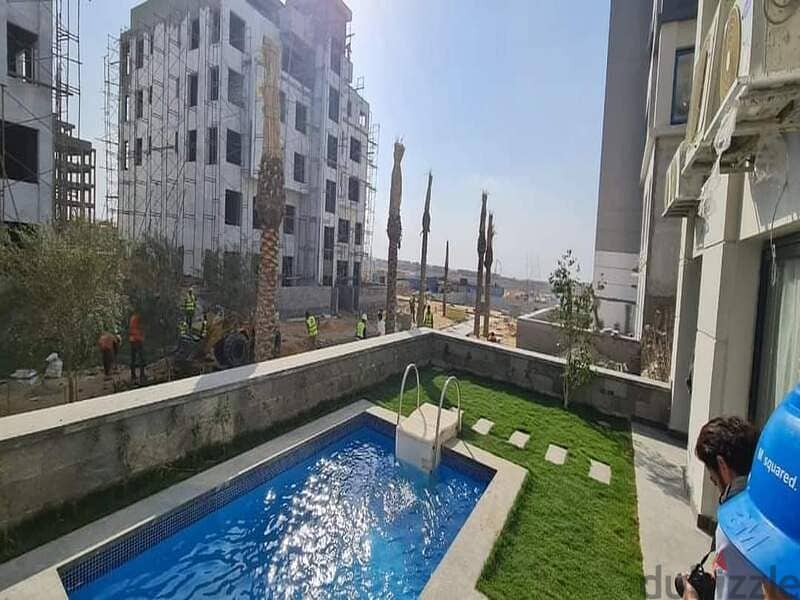 Apartment for sale with garden in Trio Gardens Compound in Golden Square, New Cairo 8