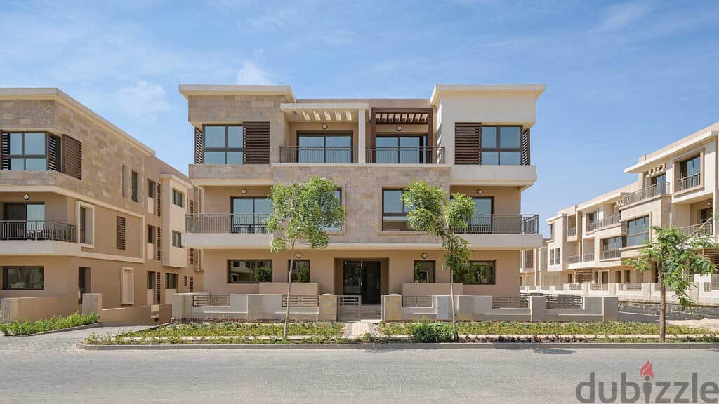 4 bedrooms with a spacious garden for sale on the Suez Road directly next to Madinaty, 205 meters, open and clear sea view in Sarai Compound from Nasr 6