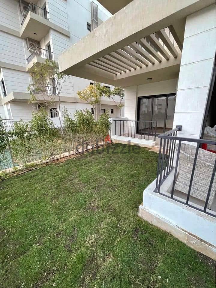 Apartment with garden (immediate receipt + finished with AC'S) for sale in the Fifth Settlement, Al Marasem Fifth Square Compound 1