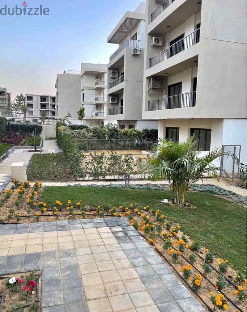 Apartment with garden (immediate receipt + finished with AC'S) for sale in the Fifth Settlement, Al Marasem Fifth Square Compound 2