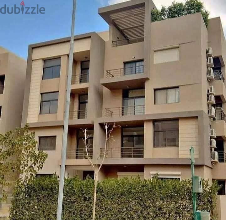 Apartment with garden (immediate receipt + finished with AC'S) for sale in the Fifth Settlement, Al Marasem Fifth Square Compound 12