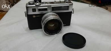كاميرا ياشيكا YASHICA اليابانية الأصلية و محتوياتها 0