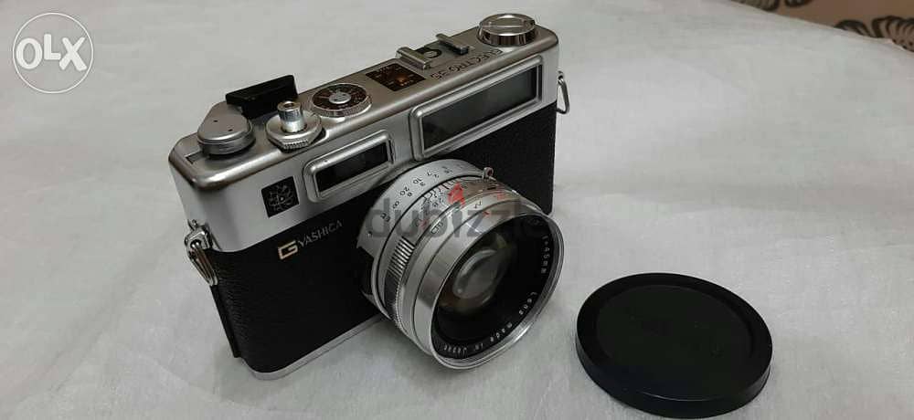 كاميرا ياشيكا YASHICA اليابانية الأصلية و محتوياتها 1