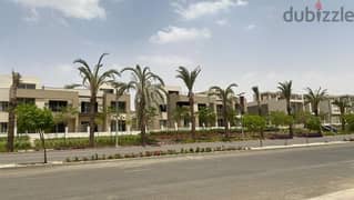 Townhouse for sale, semi-finished, with private roof, in the best location in Palm Hills New Cairo