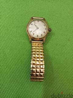 ساعة يد قديمة سويسري ملو شغاله بحاله ممتازة من سنة1959