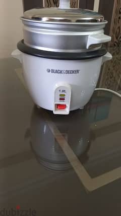 حلة طهي الرز كهربائيه
