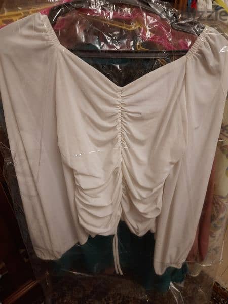 white blouse used 1 time size M from 55 to 75 k 1