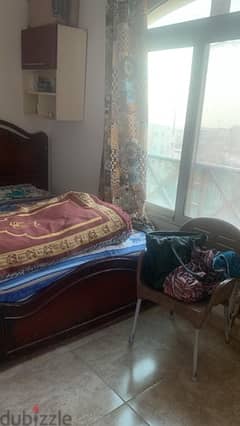غرف سنجل و سرير للايجار بالنرجس عمارات علي شارع رئيسي