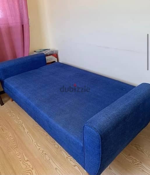 Blue sofa turns into bed 3
