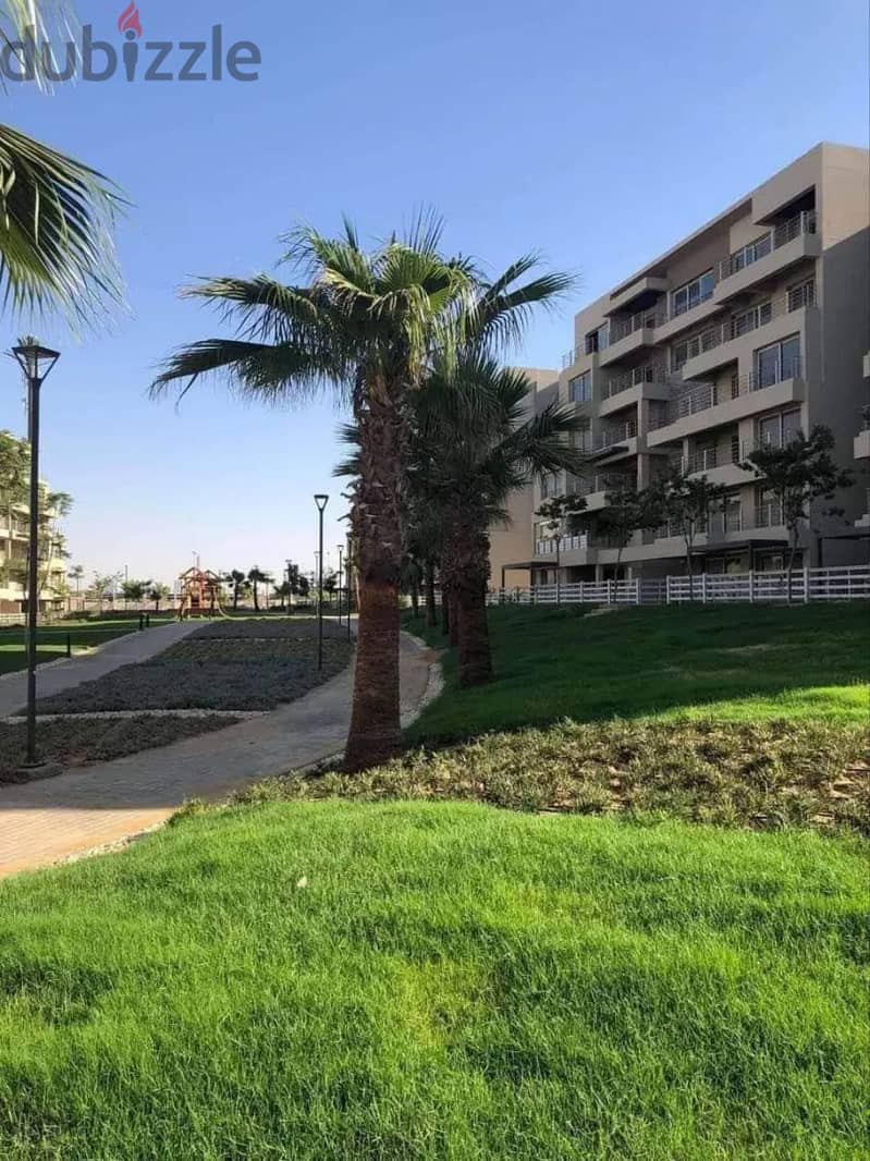 166 sqm apartment on Suez Road in front of the airport with a 10% down payment in Taj City Compound 1