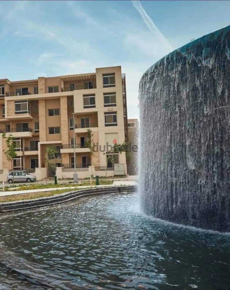 166 sqm apartment on Suez Road in front of the airport with a 10% down payment in Taj City Compound 2
