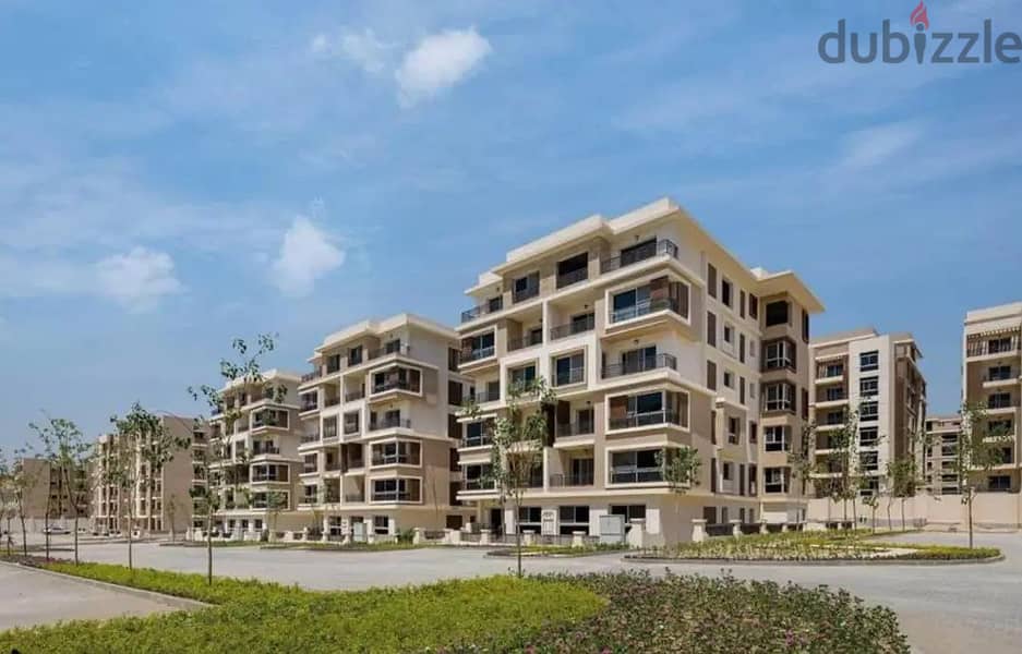 166 sqm apartment on Suez Road in front of the airport with a 10% down payment in Taj City Compound 4