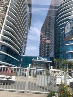 I own an apartment with immediate receipt, first row, on the Nile, fully finished, service by Hilton, under the management of Hilton Hotel 0