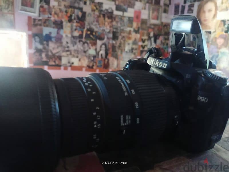 كاميرا نيكون D90 مع عدسه 70/300 0