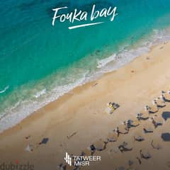In installments, a furnished chalet with hotel services, first row on the sea, in Fouka Bay, North Coast