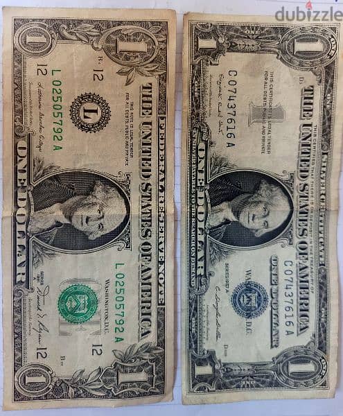 دولارين امريكي يرجع لعام 1957 واخر لعام 1981 0