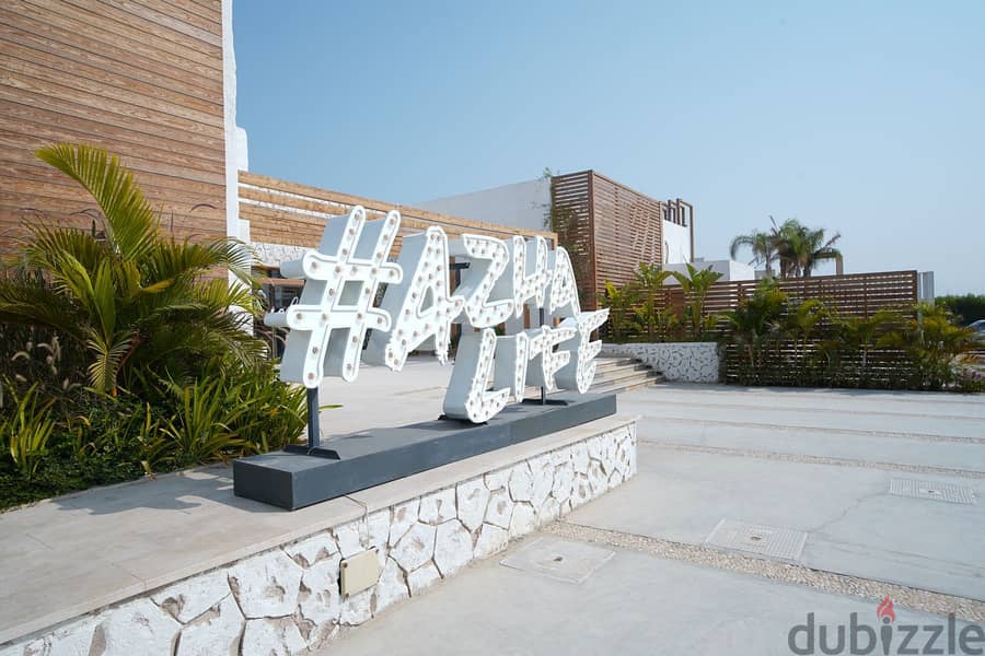 Chalet for sale in the North Coast, on the largest Crystal Lagoon + sea panorama view, Azha Village, Ras Al-Hikma, two rooms for sale in installments 6