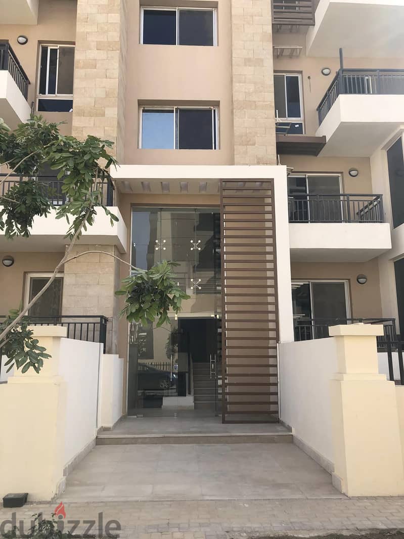 With a 42% discount, a distinctive apartment for sale in the heart of the settlement, Taj City, on the Suez Road, directly in front of Cairo Airport, 2