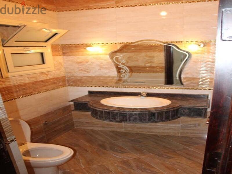 An apartment for rent legally in a luxury villa in the First Settlement in Banafseg 6 18