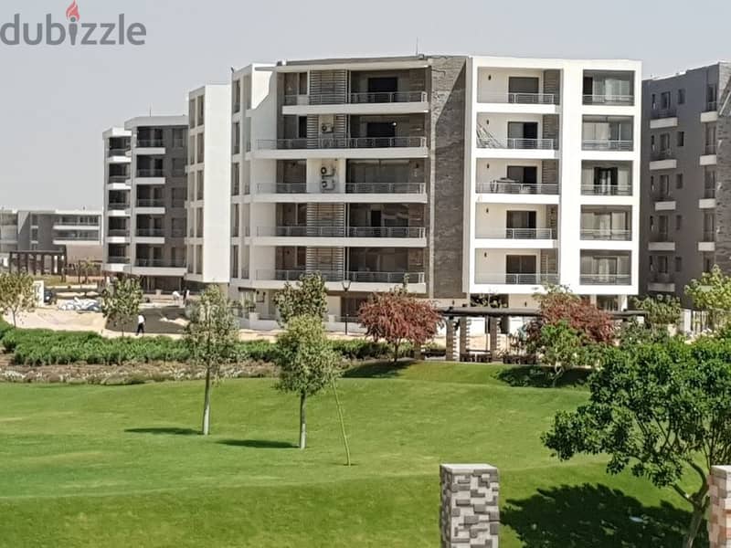 apartment for sale in a great location, competitive price, and a landscape view in Taj City Compoun In front of Cairo Airport Direc 9