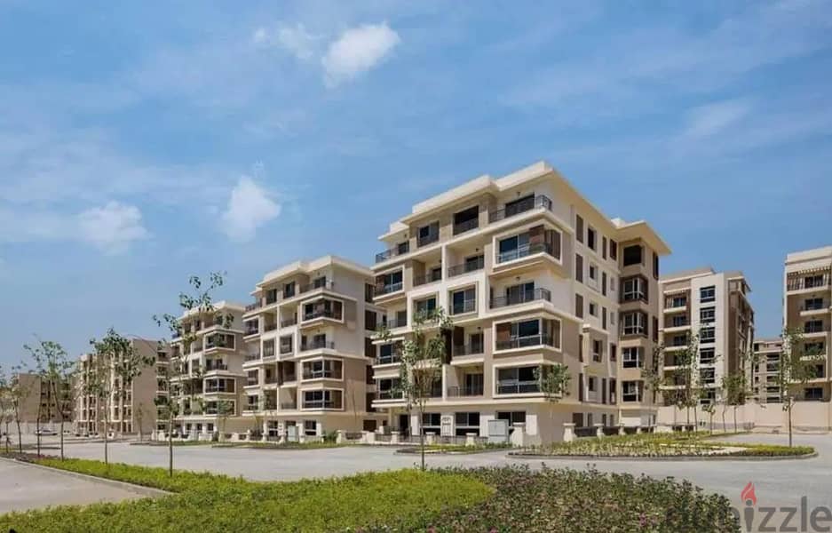 apartment directly in front of the airport with a 10% down payment in Taj City Compound, Fifth Settlement 5