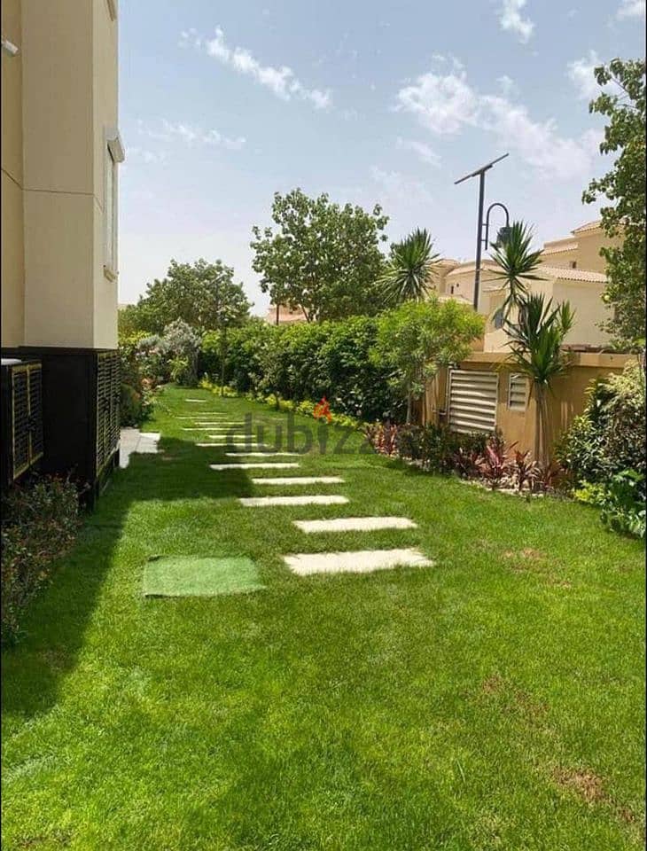 ivilla for sale in new cairo - Telal East Compound, 233 meters + large garden- private and unobtrusive - view open to green spaces 5