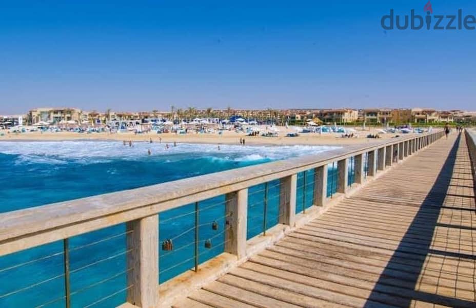 With a 20% discount, a chalet with immediate receipt, finished, on the sea, in the village of La Vista Ras El Hekma North Coast , installments 13
